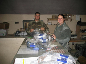 The soldiers are all smiles over their new socks.